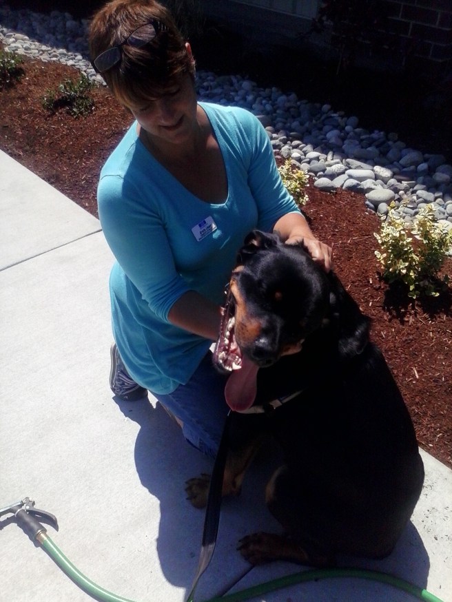 Rudy visiting with WHS Humane Education Coordinator Krista Unser